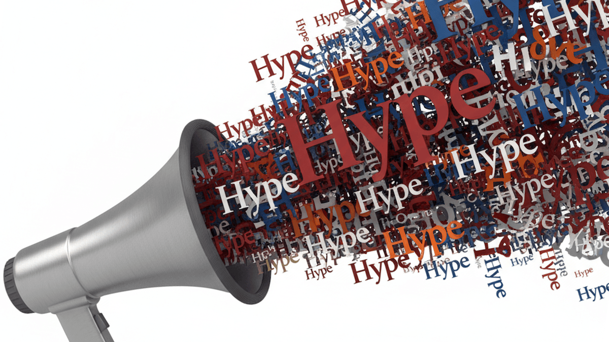 A megaphone emits a colorful stream of 3D words spelling &quot;Hype&quot;, symbolizing the AI hype discussed in the article.