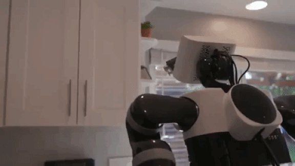 Robot being trained using a virtual reality interface