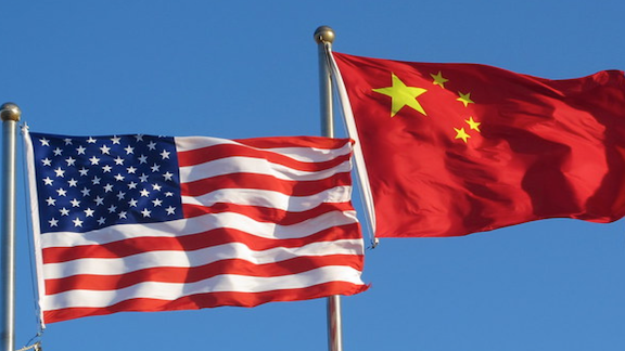 US flag on the left, China flag on the right