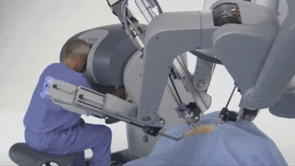 Surgical robots performing different actions 