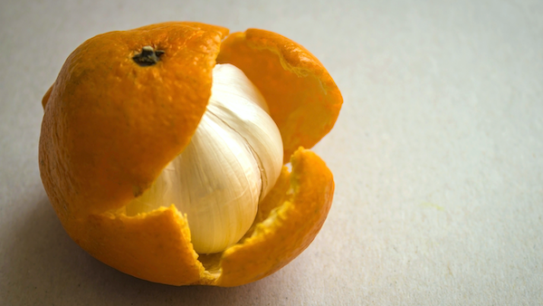 Onion inside a tangerine peel