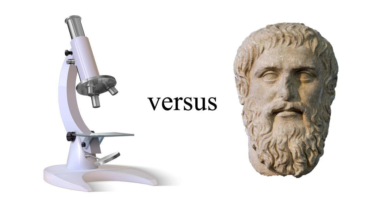 Microscope and Plato's head statue