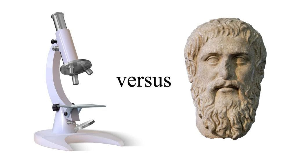 microscope versus statue