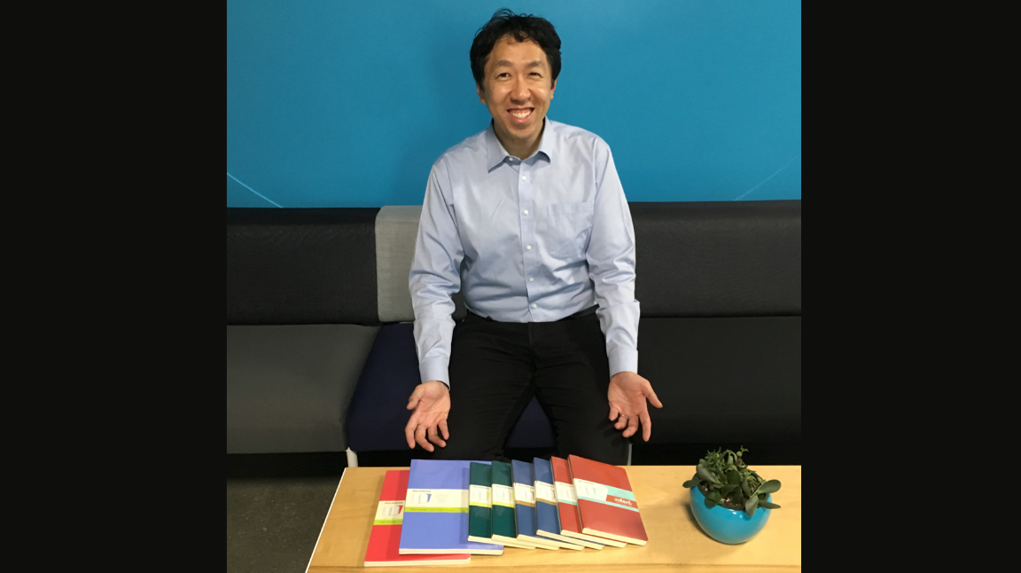 Andrew Ng with a stash of new blank notebooks
