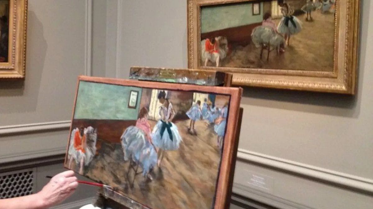 Artist copying the painting called The Dance Lesson by Edward Degas at the National Gallery Museum 