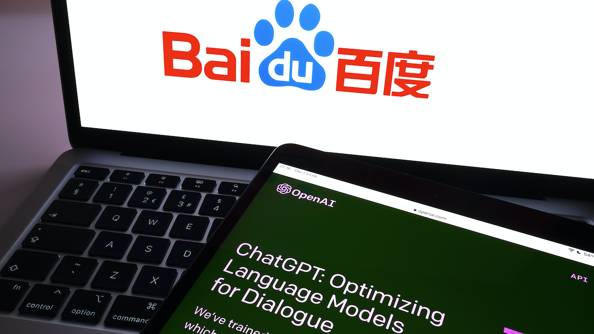 Laptop displaying the Baidu logo and tablet displaying OpenAI's ChatGPT website homepage 